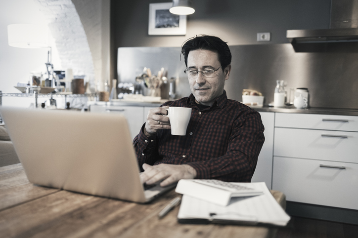 A man researching what is a trigger rate in an annuity.