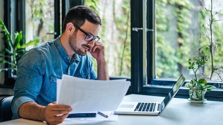 A man completes a direct rollover to consolidate two retirement accounts.