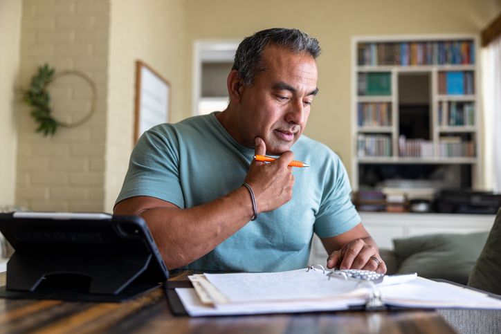 A man reviewing his retirement plan.